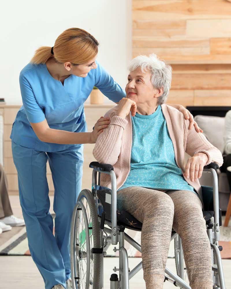 Medicaid Planning: Nurses assisting elderly people at retirement home