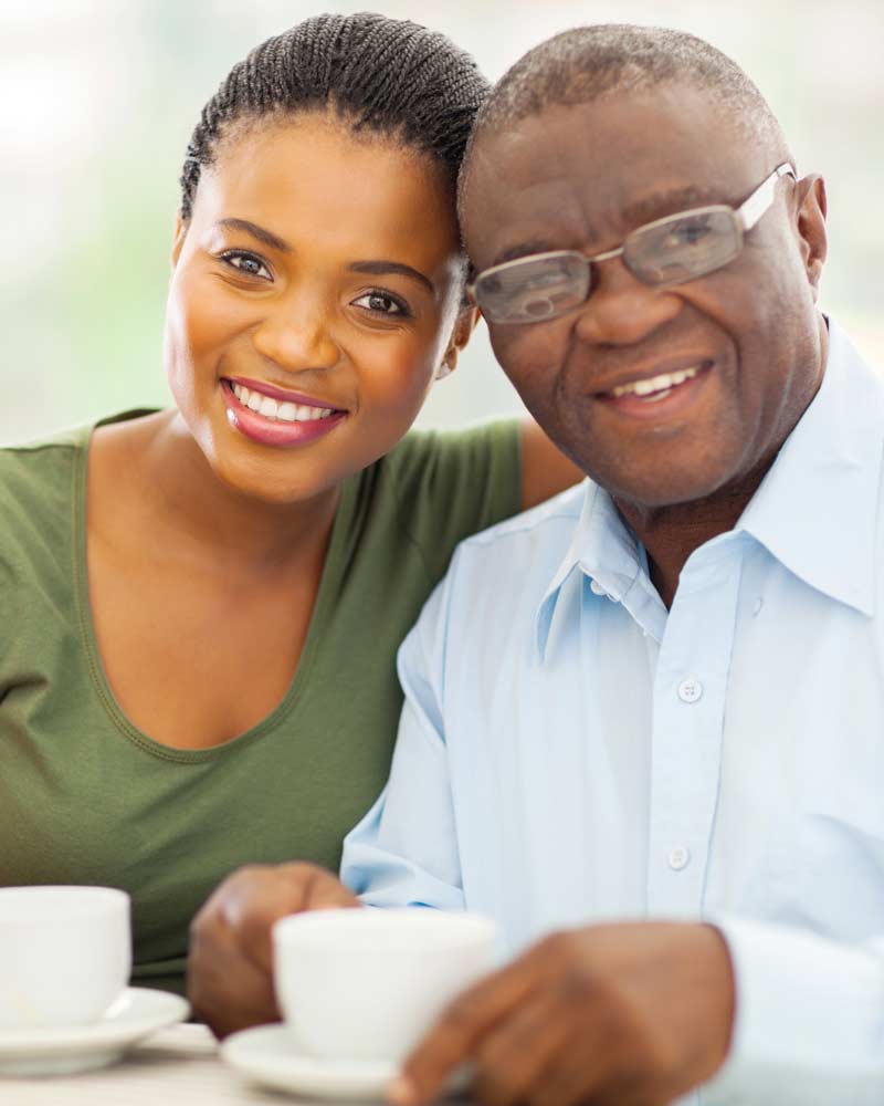 Financial Guidance: photo of adult daughter with senior father