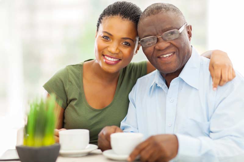 Financial Guidance, Estate Planning Solutions: photo of adult daughter with senior father